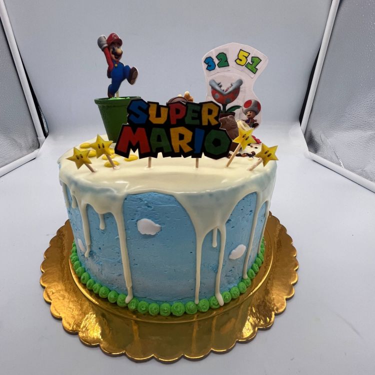 Imagen de tarta de cumpleaños personalizada de super mario bros con muchos colores 